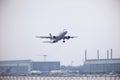 Lufthansa plane landing in Munich Airport, winter time with snow